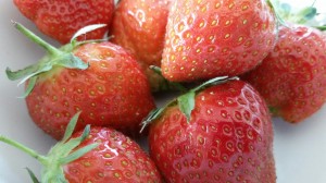 Bright Red, Fresh Strawberries with Green Stalks
