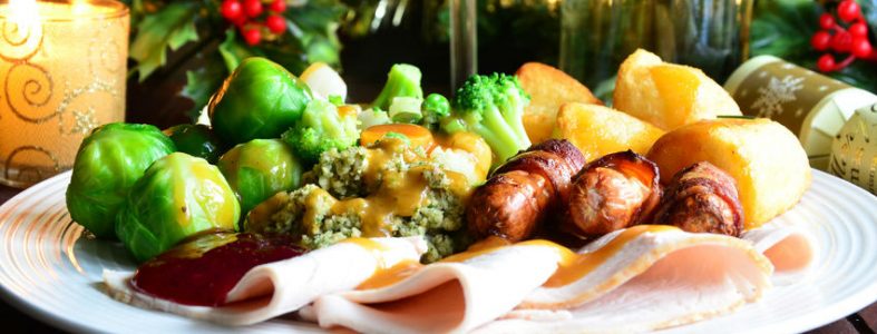 Photo of a Christmas meal with roast potatoes and sprouts
